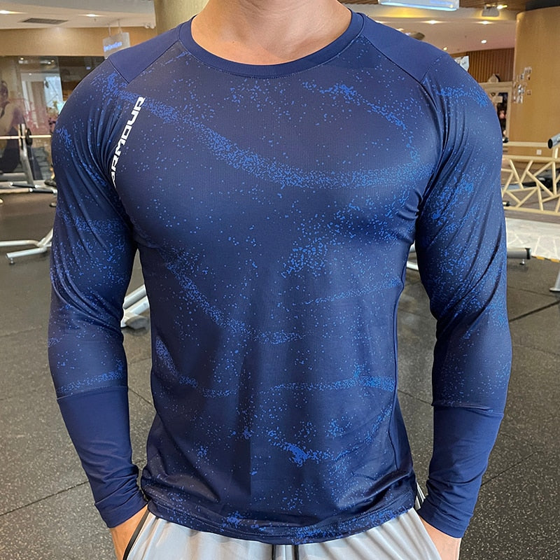 Men's Long Sleeve Gym Shirt, Sportswear Compression with Dry Fit Technology. Designed for Fitness and Sports, this Tight-Fitting T-Shirt keeps you Comfortable and Dry during Intense Workouts.