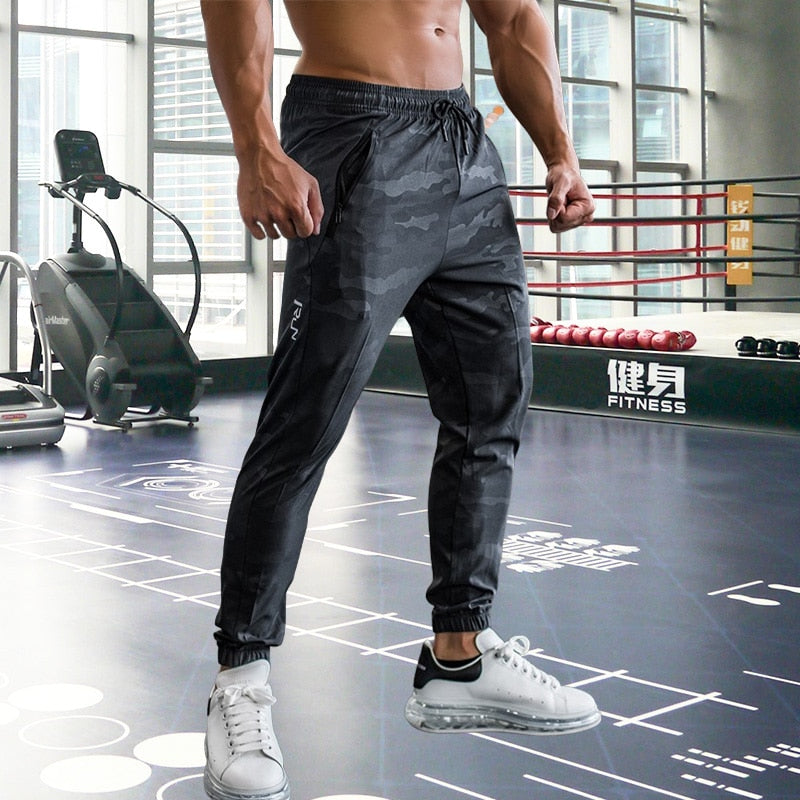 Mens Gym Fitness Running Sweatpants Workout Athletic Long Pants Outdoor Training Sports Trousers Elastic Waist Zipper Pockets